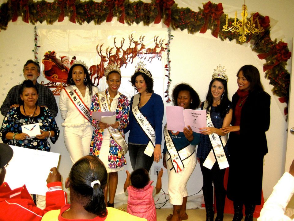 Daisi and fellow pageant winners at the JWCH holiday gathering